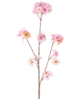 La Fleur de Cerisier Artificielle 85 cm rose possède une seule tige marron avec de multiples branches, chacune décorée de bouquets de délicates fleurs de cerisier artificielles rose clair, sur un fond blanc uni.