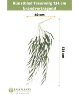 Feuille artificielle Saule pleureur 134 cm ignifuge avec de longues feuilles vertes fines (40 cm de large). Les informations sur la taille et la marque sont affichées en haut et en bas sur un fond blanc.