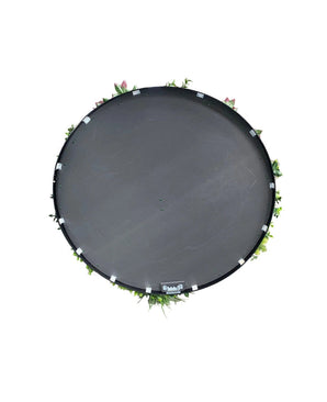 Haie Artificielle sur Cadre Noir Ø100 cm, avec petites plantes vertes et fleurs roses sur un plateau rond noir, vue de dessus sur fond blanc.
