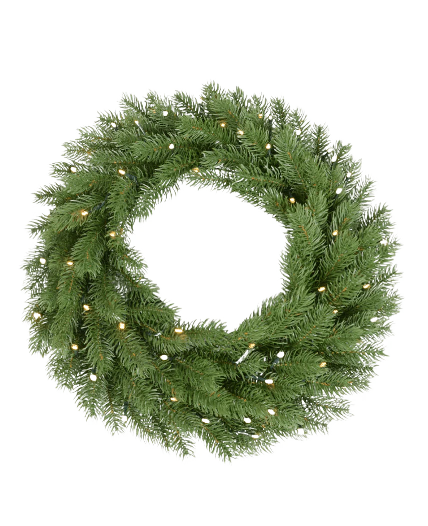 La Couronne Artificielle 100% PE Premium - Smart LED est une couronne ronde de haute qualité, décorée de petites lumières LED blanc chaud, représentées sur un fond blanc uni.